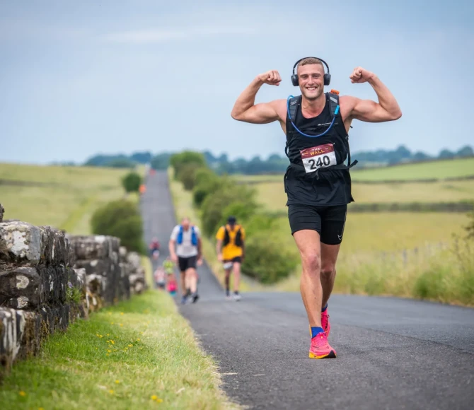 Man running along Hadrian's Wall