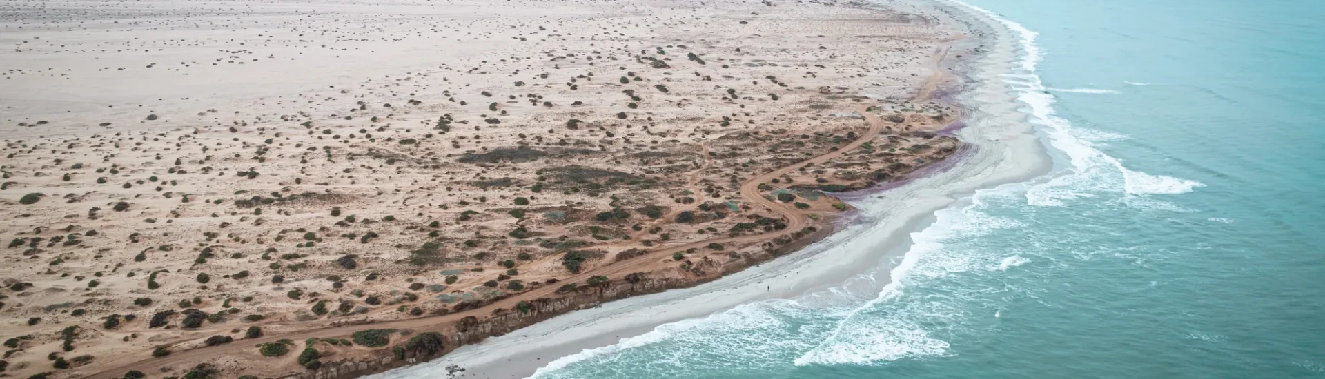 Sandy coastline and blue, clear water