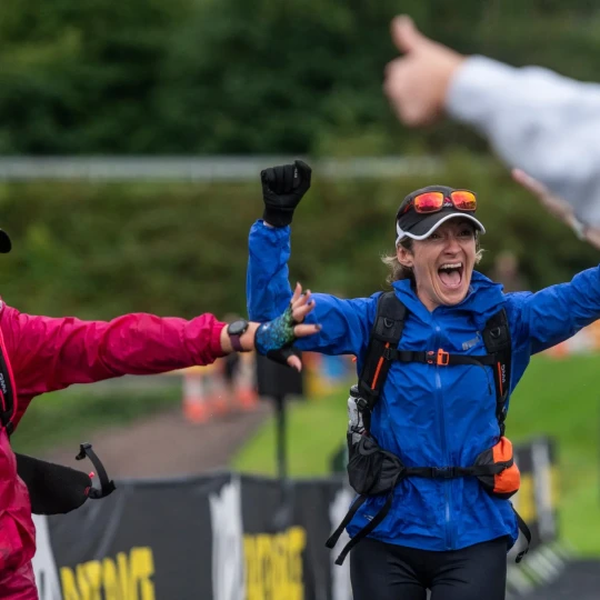 Women celebrating at finish