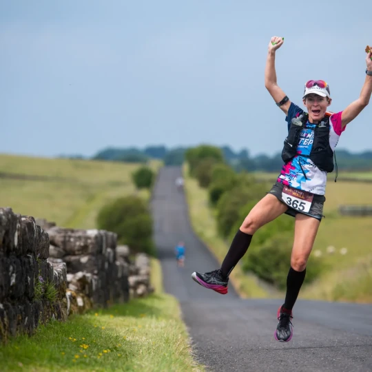 Woman jumping in air