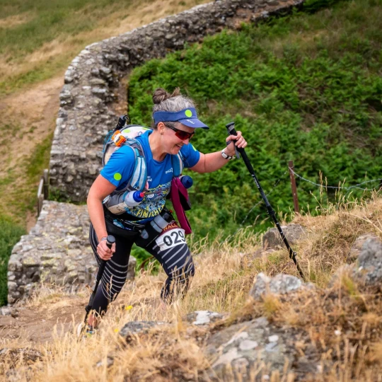 Woman walking up hill