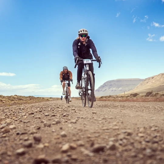 Cyclists riding on rocky terrain