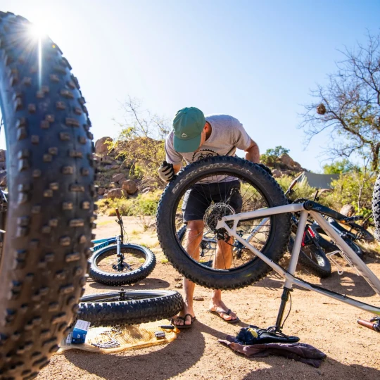 Man fixing bikes