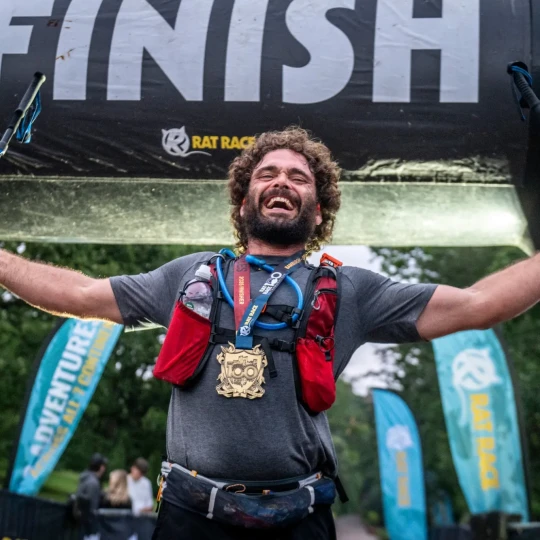 Man celebrating at finish