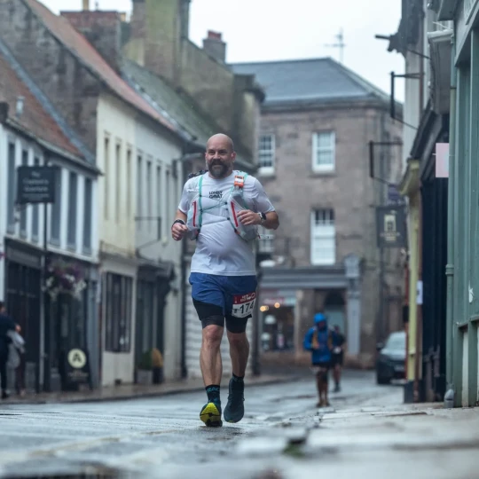 Man running through urban setting