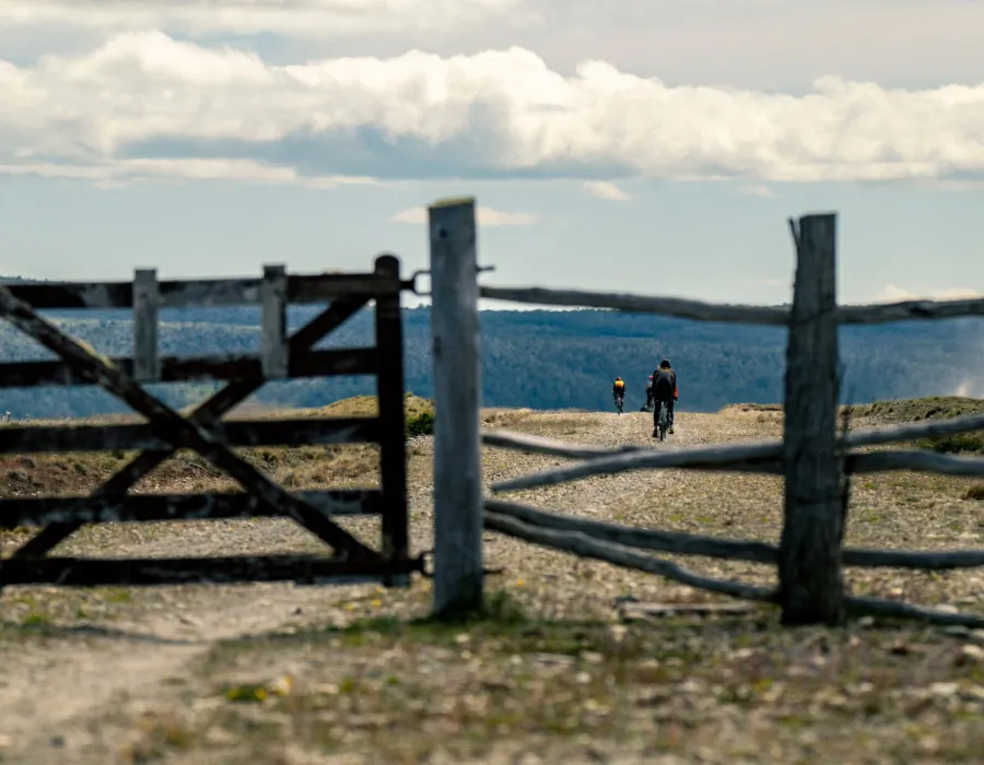 Cyclists riding on rocky path