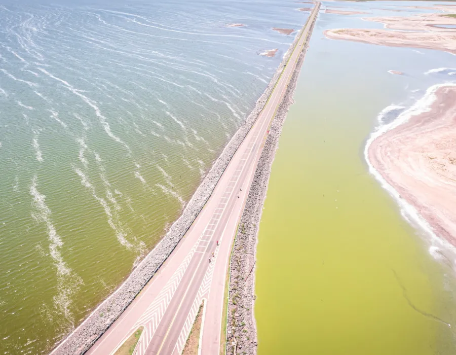 Aerial view of road leading through water