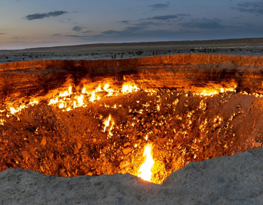 Crater in ground on fire