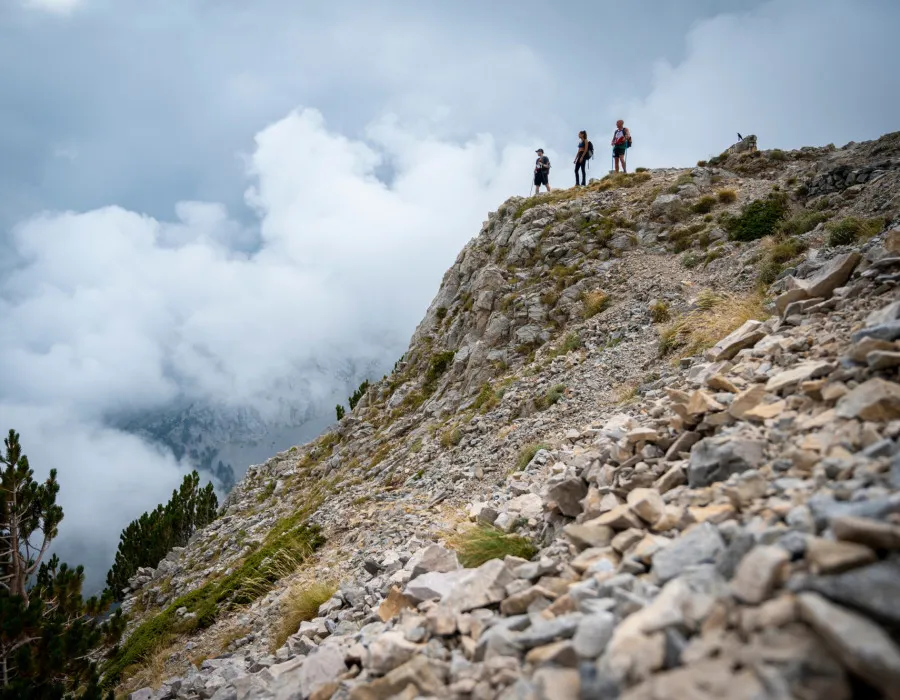 People stood at top of of rocky terrain