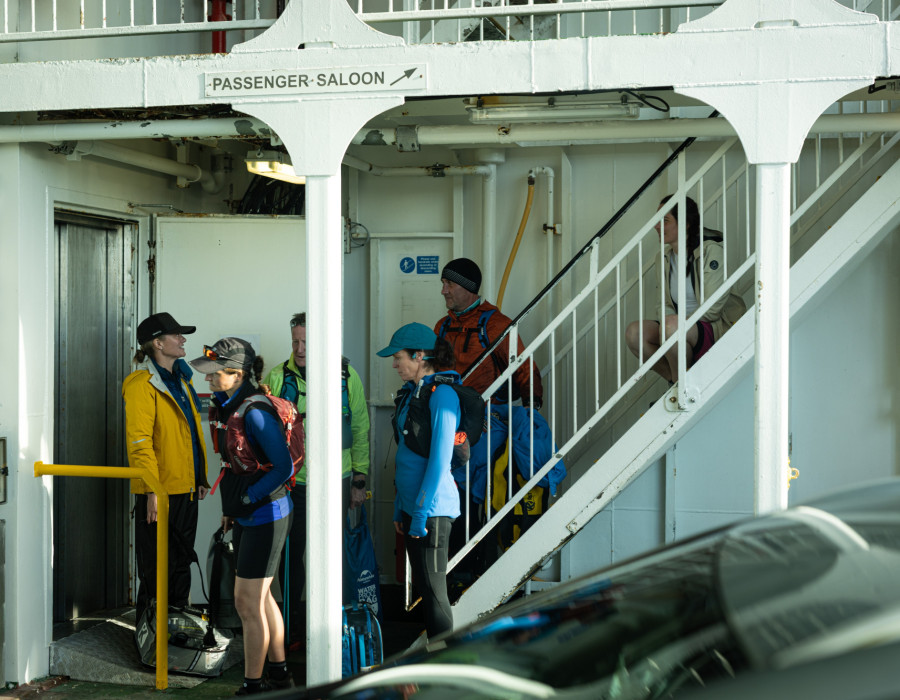 Participants chatting and stood on ferry