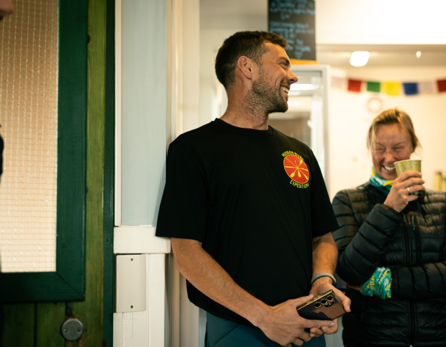 Man holding his phone and laughing