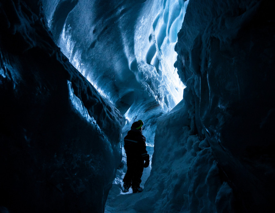 Participant walking through icy cave