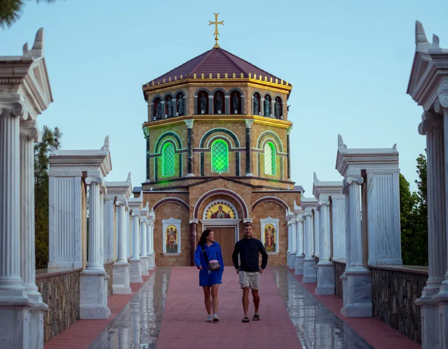 Man and woman walking away from a church