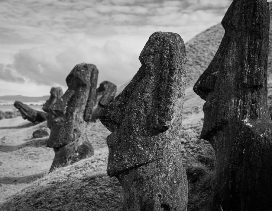 Black and white photo of large Easter Island statues