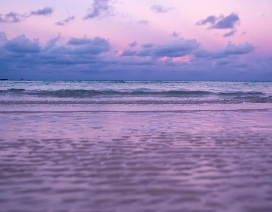 Colourful sky with calm waters below