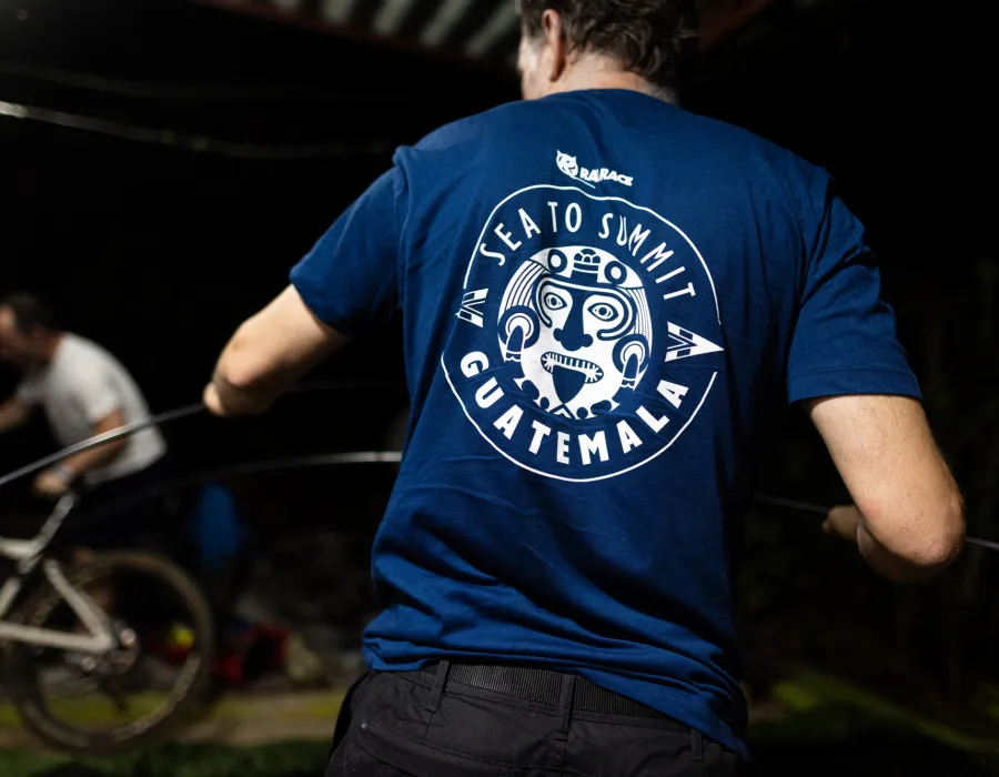 Participant stood with their back to the camera, showing their blue Rat Race Guatemala t-shirt