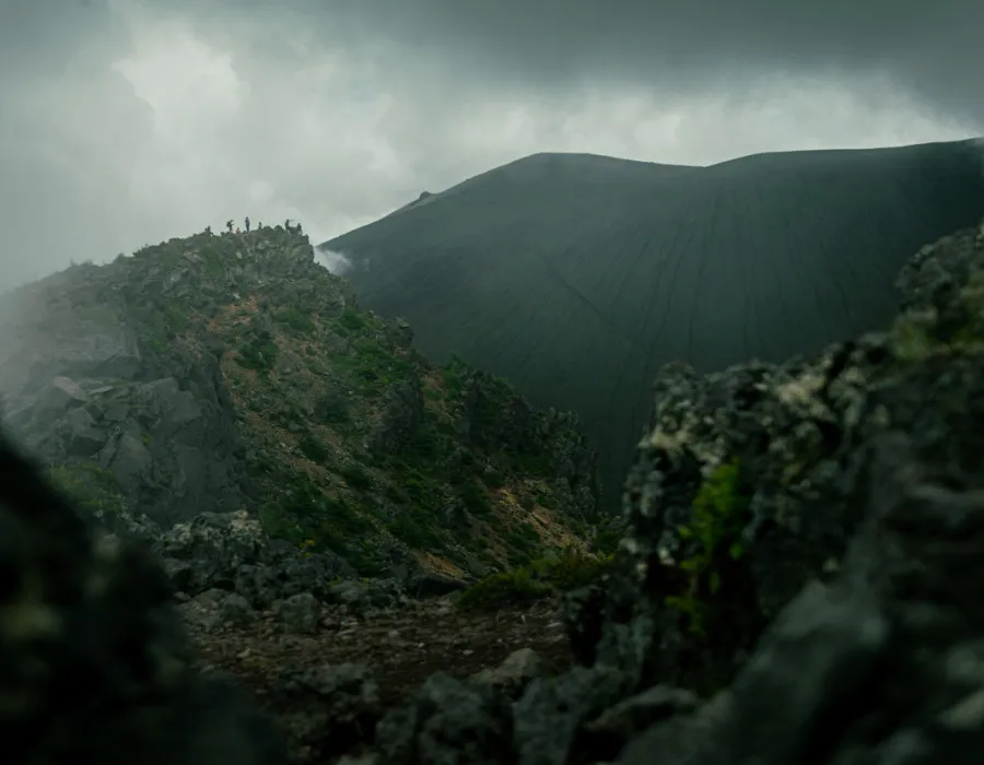 Dark, rocky terrain and mountains
