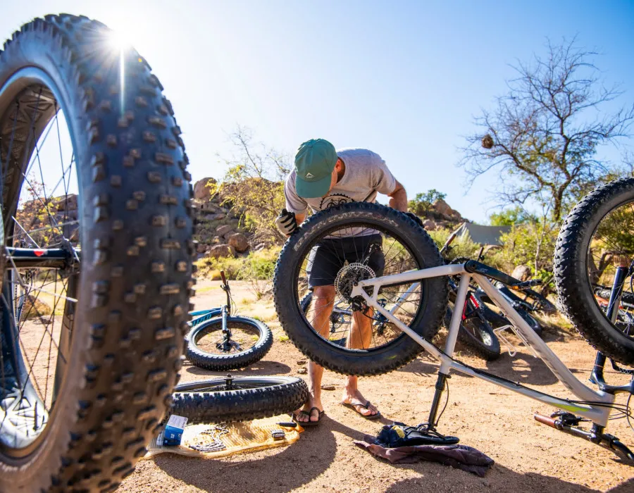 Man fixing bikes