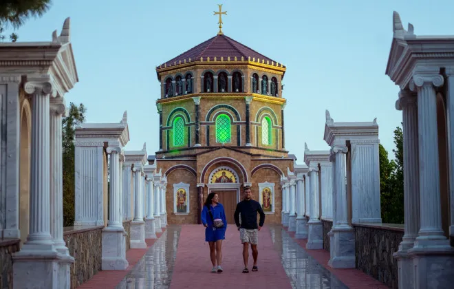 Man and woman walking away from a church