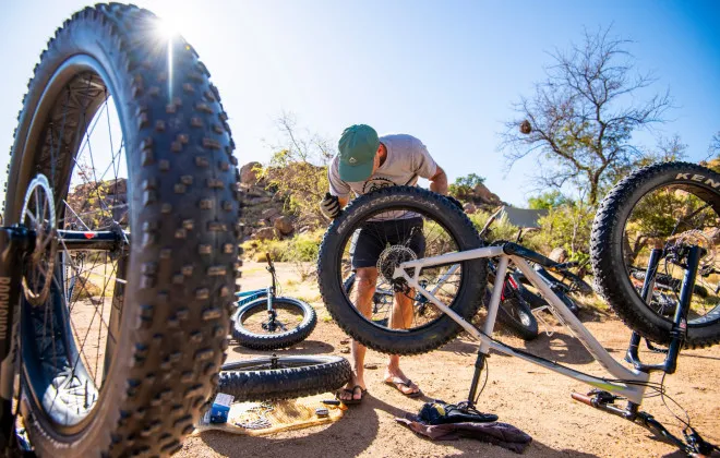 Man fixing bikes